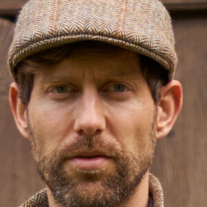 Harris Tweed Flat Cap "Henry" In Sand Herringbone
